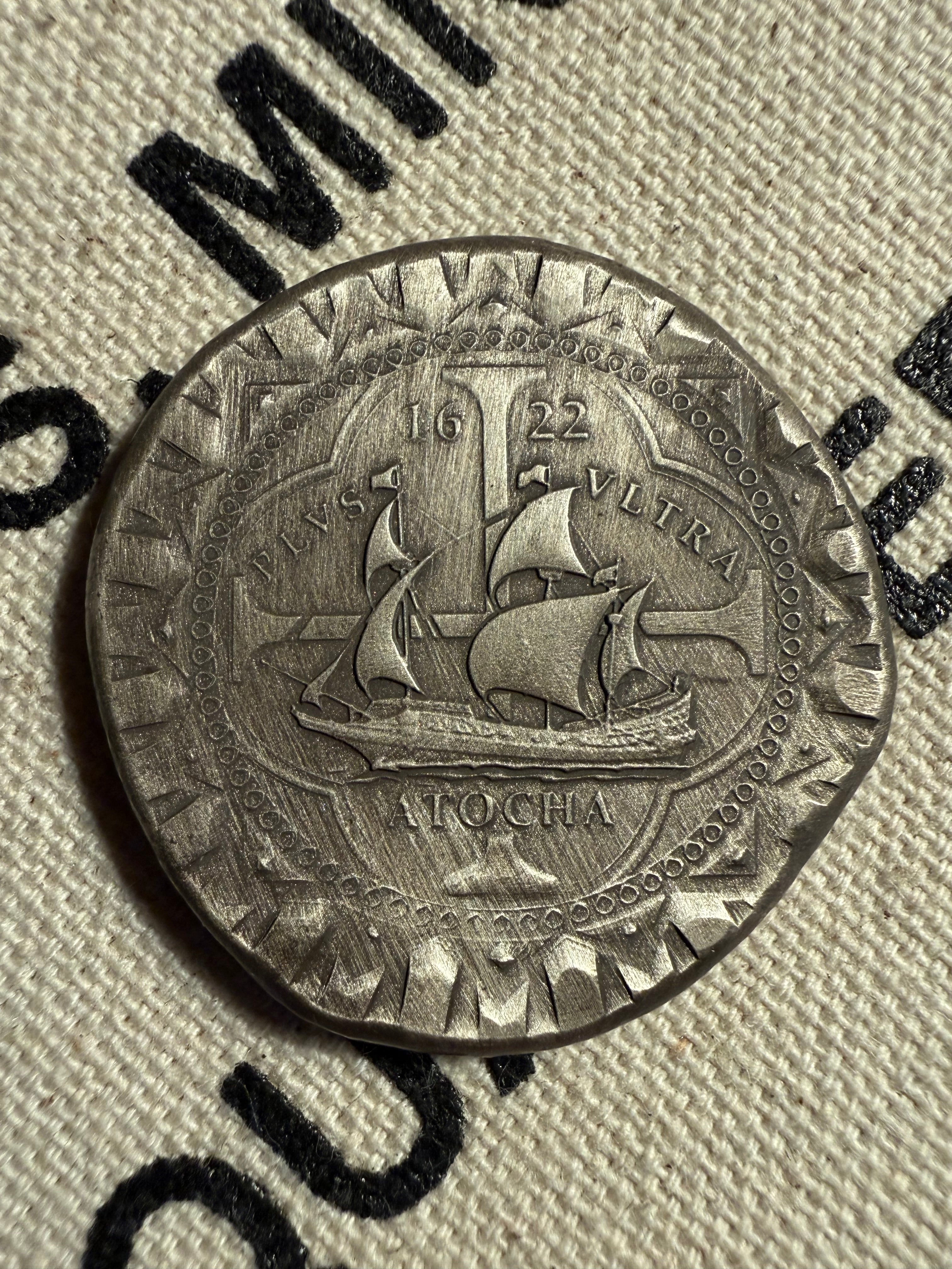 1622 Atocha silver cob round by Daniel Carr, obverse with antiqued shipwreck finish