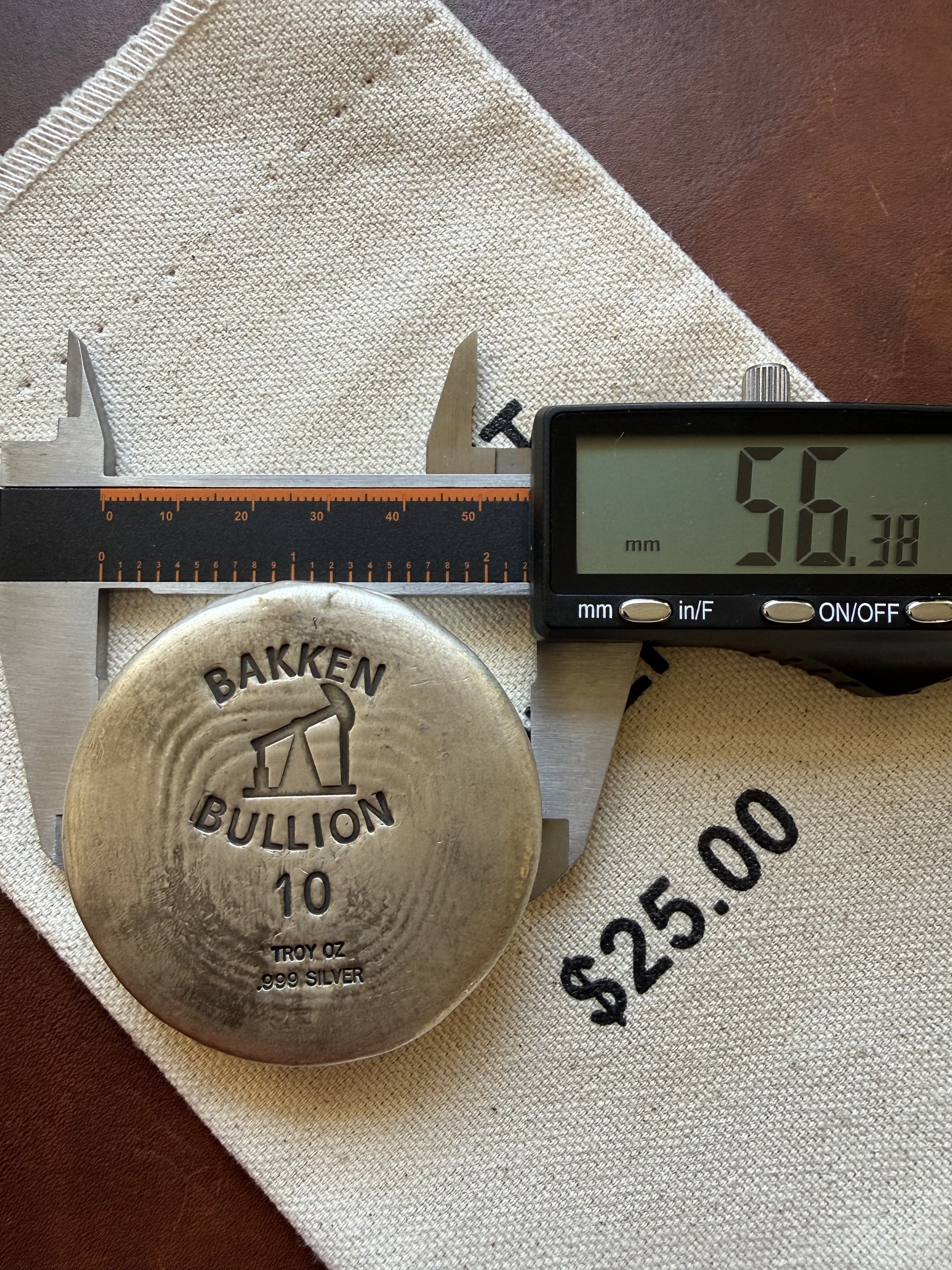 Bakken Bullion Silver Round - 10ozt, Artisan, Hand Poured, Pumpjack logo