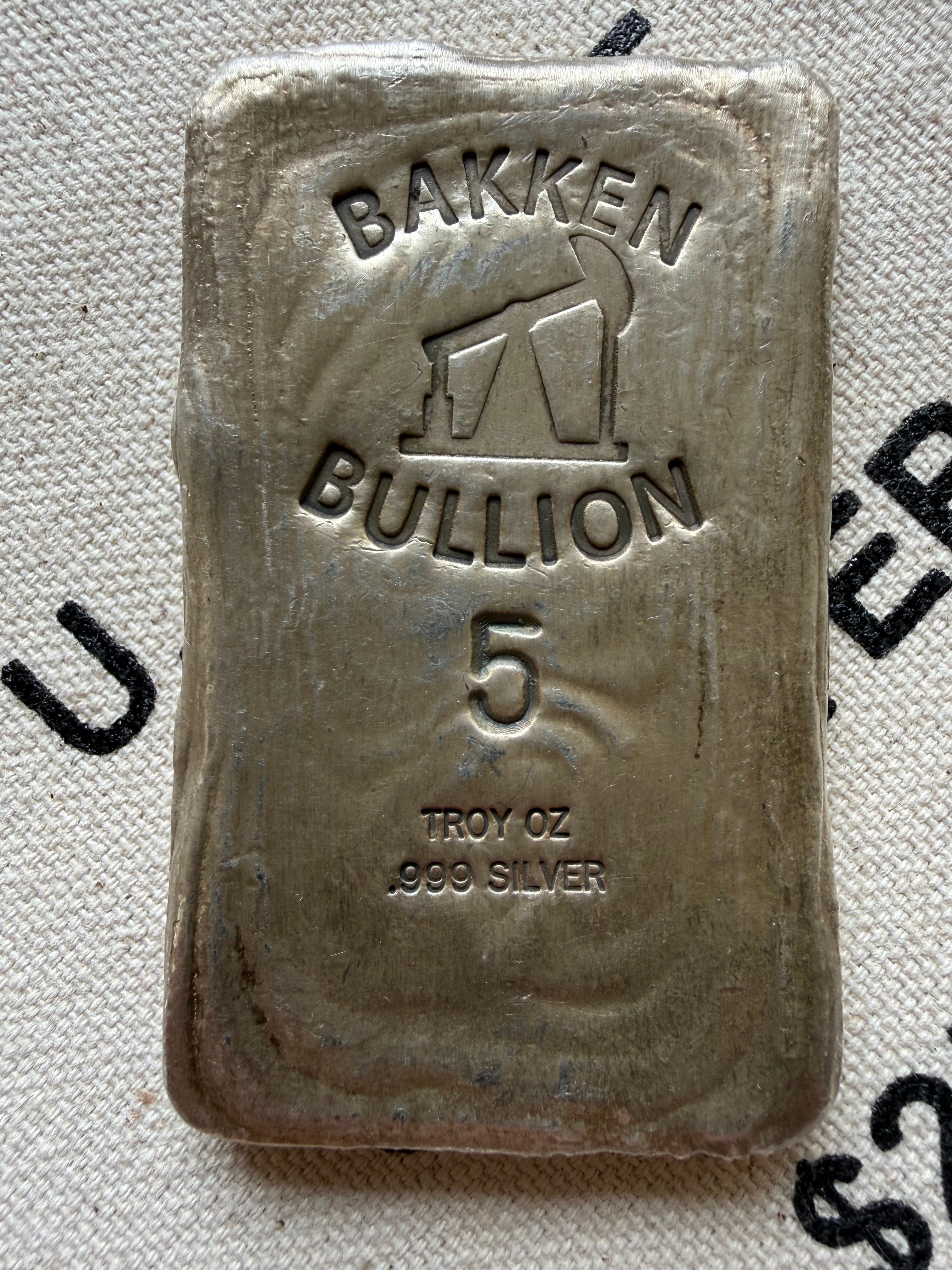 Bakken Bullion Silver Bar - 5ozt, Artisan, Hand Poured, Pumpjack logo