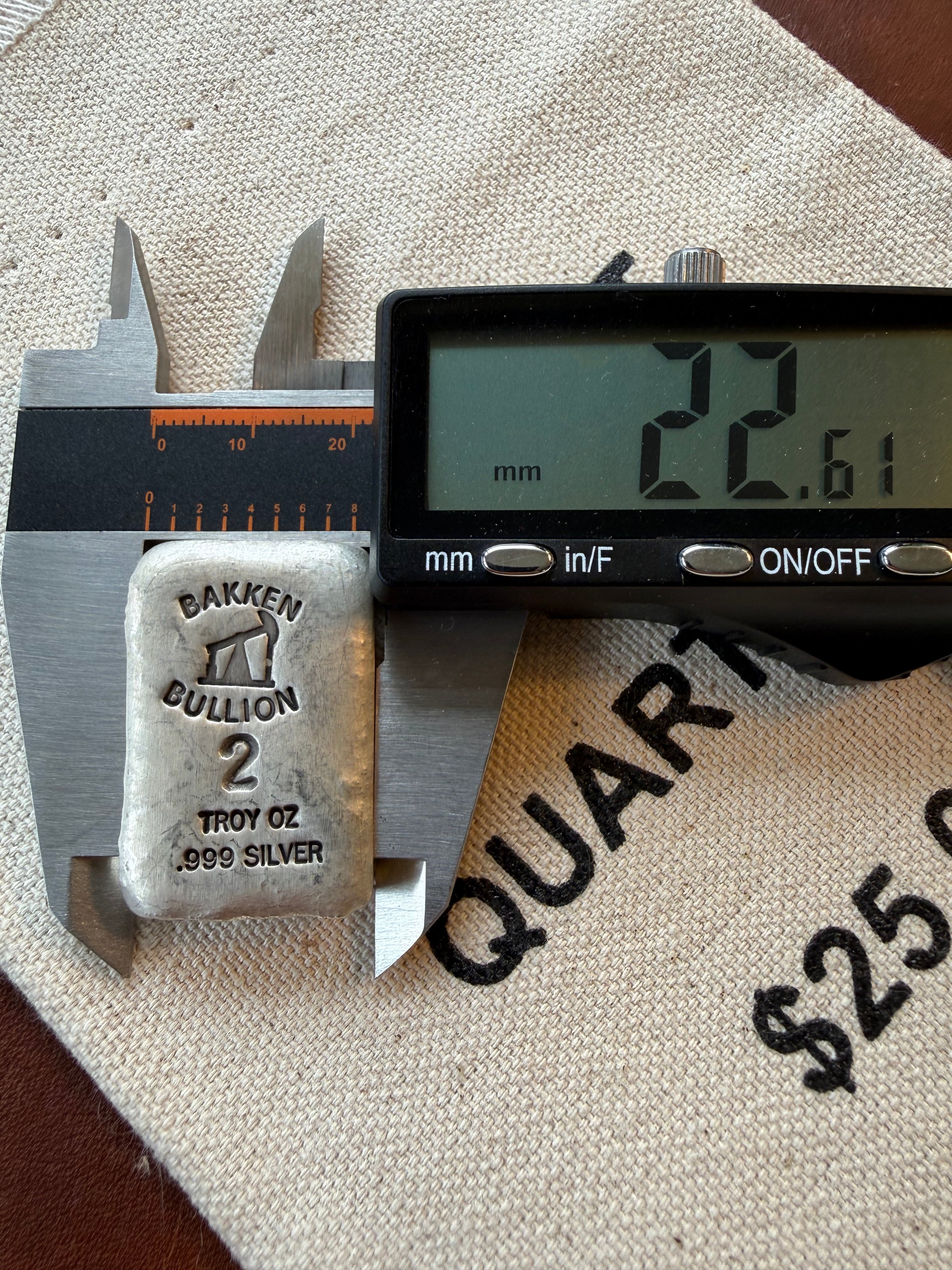 Bakken Bullion Silver Bar - 2ozt, Artisan, Hand Poured, Pumpjack logo